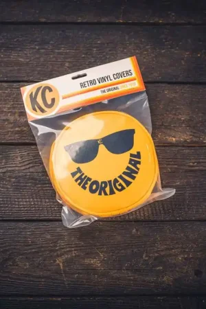 KC HiLiTES Retro 6in Round Yellow Vinyl Light Cover w/ Black KC Sunglasses Logo Don’t Miss Out